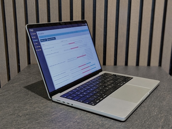 Open laptop with tap running on it